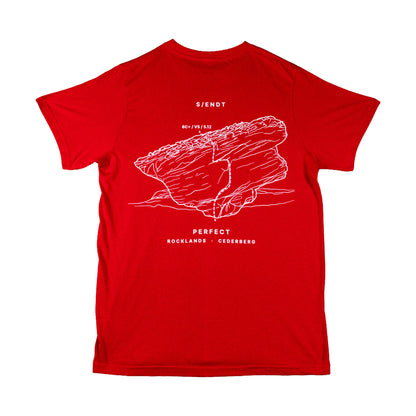 A red short-sleeve t-shirt with a white line art graphic of a rock formation on the back, accompanied by the text 'S/ENDT', 'PERFECT ROCKLANDS | CEDERBERG'
