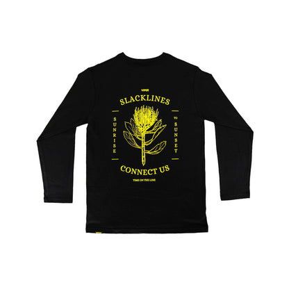 Black long-sleeve shirt with yellow graphic design on a white background